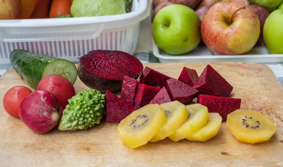 Young beets on wooden table close up