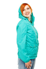 Portrait of a young beautiful girl in a jacket with a hood isola