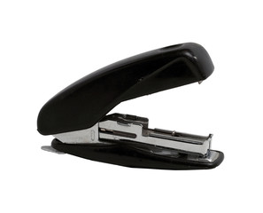 old dusty black office stapler on a white background