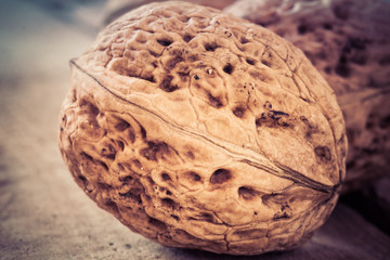 Walnuts on a wooden table.