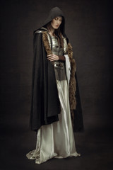 Beautiful Girl warrior in medieval clothes - obrazy, fototapety, plakaty