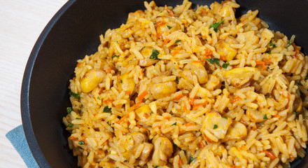 rice with mushrooms in a frying pan