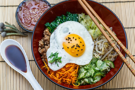 bibimbap in a bowl, korean dish top view