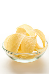 Fototapeta na wymiar potato chips in a glass bowl