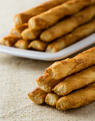 many pastry sticks with cheese