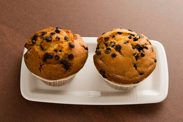 chocolate chip muffins on plate