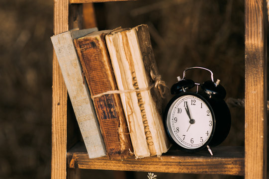 Old Books On The Shelf Clock