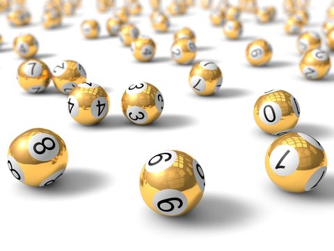 golden lottery balls with depth of field