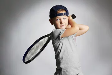 Poster Little Boy Playing Tennis. Sport kids.Child with Tennis Racket © eugenepartyzan