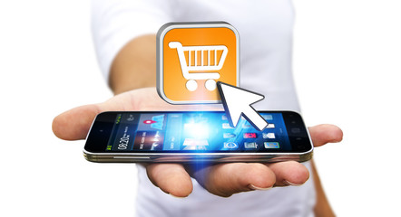 Young man shopping with his mobile phone