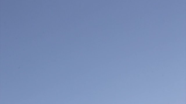Silhouette view of commercial plane approaching Faro Airport 