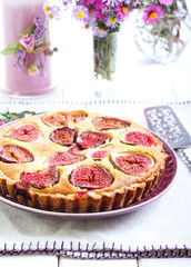 Almond and fig tart on plate