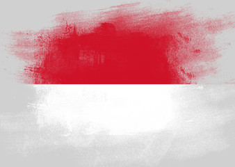 Fototapeta na wymiar Flag of Monaco painted with brush