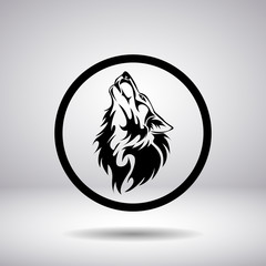 Fototapeta premium Silhouette of a wolf head in a circle