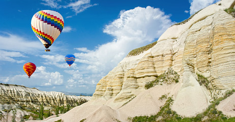 Hot air balloons flying over Love valley at Cappadocia, Turkey