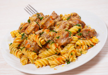Fusilli pasta with sausage and vegetables
