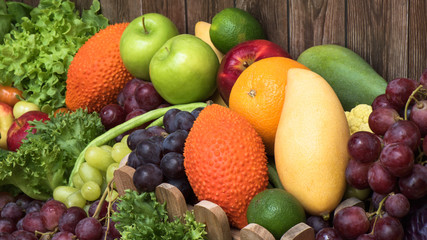Obraz na płótnie Canvas Tropical fruits and vegetables for healthy