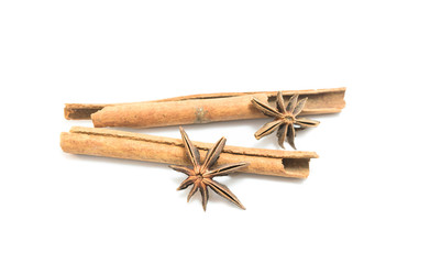 Cinnamon and chinese star anise on white background