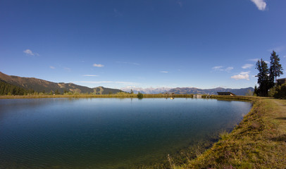 Water Reservoir On Schmittenhöhe In Zell Am See With View To Steinernes Meer & Hochkönig