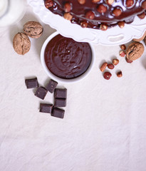 Delicious chocolate cakes with hazelnut on table, close-up of ch
