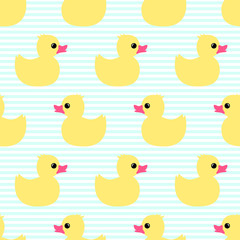 Cute seamless pattern with yellow rubber duck on striped background. Duck toy baby shower illustration.