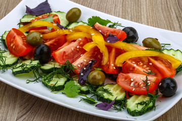 Salad with tomato, cucumber and olives
