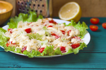Caesar Salad on a serving plate on a table