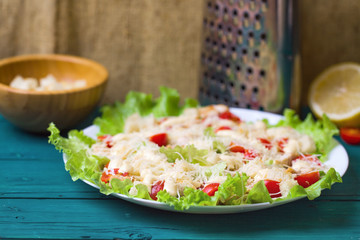 Caesar Salad on a serving plate on a table