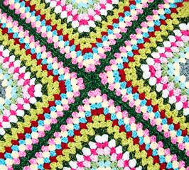 multicolored plaid square of crocheted