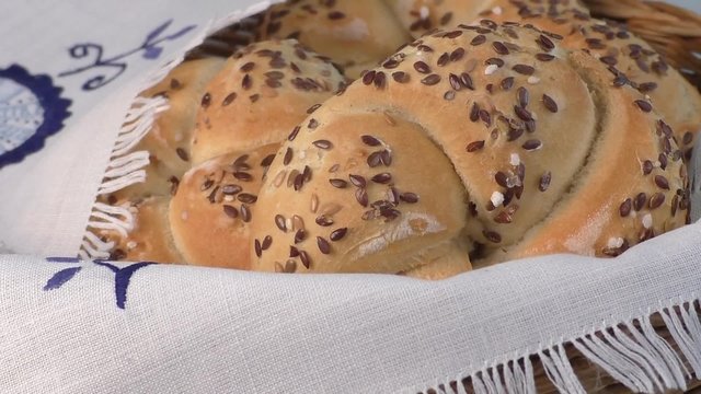 Closeup of kaiser rolls in a basket 
