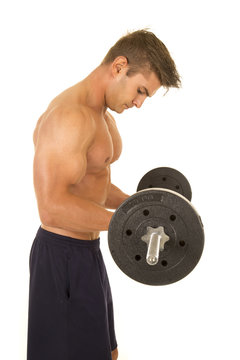 shirtless strong man side curl barbell look down