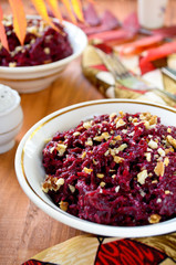 Fresh beet salad with garlic and walnuts