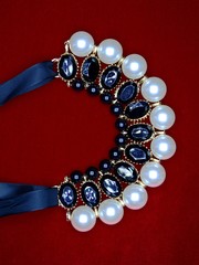  Necklace in private collection on red background