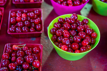 Fresh red cherries for sale at the market