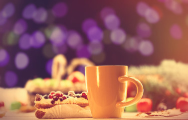 Eclair and cup of coffee