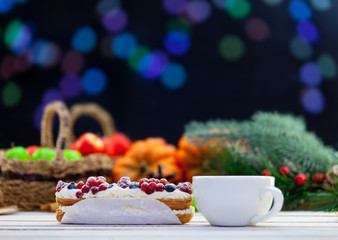 Eclair and cup of coffee or tea