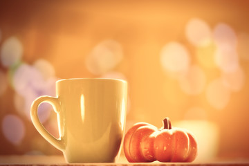 Pumpkin and cup of coffee