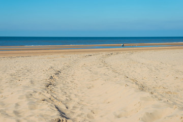 Blue sky over a beach along the North Sea