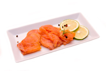 Smoked salmon on tray on white background