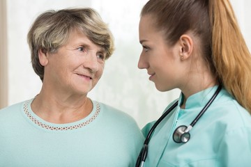 Doctor talking with senior woman