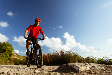 Fototapeta premium Mountain biker riding MTB