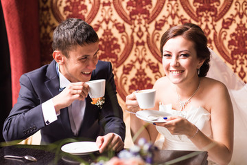 sensual happy married couple in restaurant