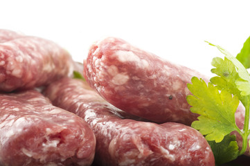 sausage with parsley leaves on the white