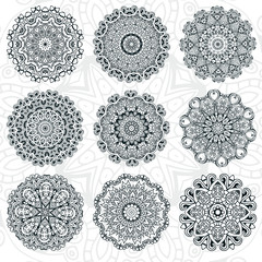 Set of abstract design element. Round mandalas in vector. Graphic template for your design. Decorative retro ornament. Hand drawn background with flowers.
