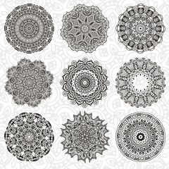 Set of abstract design element. Round mandalas in vector. Graphic template for your design. Decorative retro ornament. Hand drawn background with flowers.