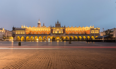 Fototapeta na wymiar The Main Market Square in Krakow, Poland, with famous Sukiennice (Cloth hall) in blue hour
