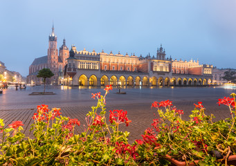 The Main Market Square in Krakow, Poland, with famous Sukiennice (Cloth hall) and St Mary's church in blue hour