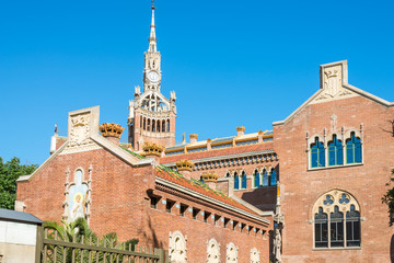 Obraz premium Buildings of the former Hospital of the Holy Cross and Saint Paul, Hospital de la Santa Creu i Sant Pau. The famous building, designed in the catalan modernisme, is a UNESCO World Heritage Site