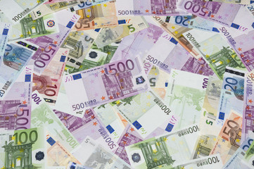 Fototapeta na wymiar Scattered euro currency banknotes, closeup view