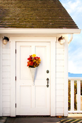 Front door of a vintage seaside cottage